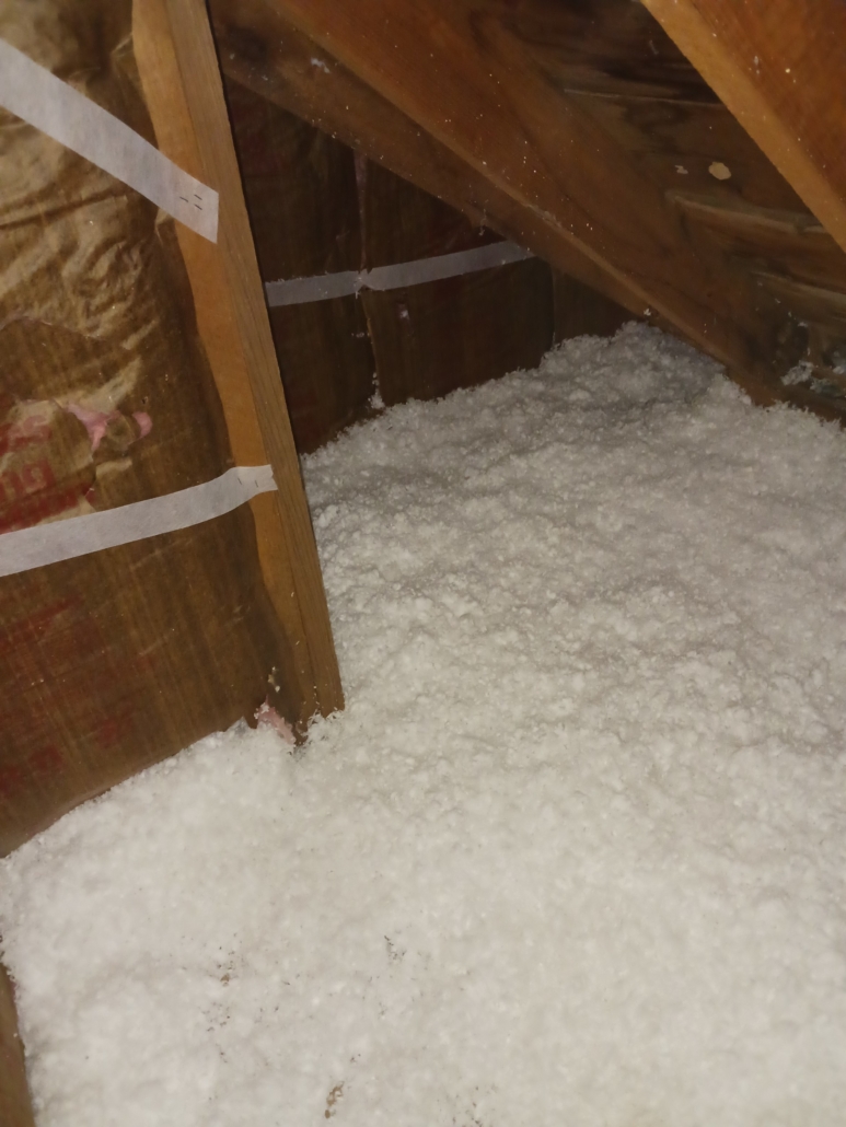 Fresh blown-in insulation in a Bastrop attic